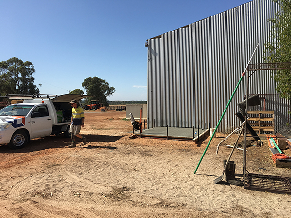 Laying concrete slab for battery room at Bonza Station