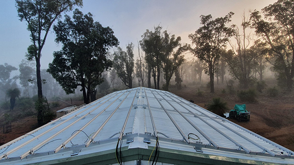 Installing PV array on workshop in Quindanning